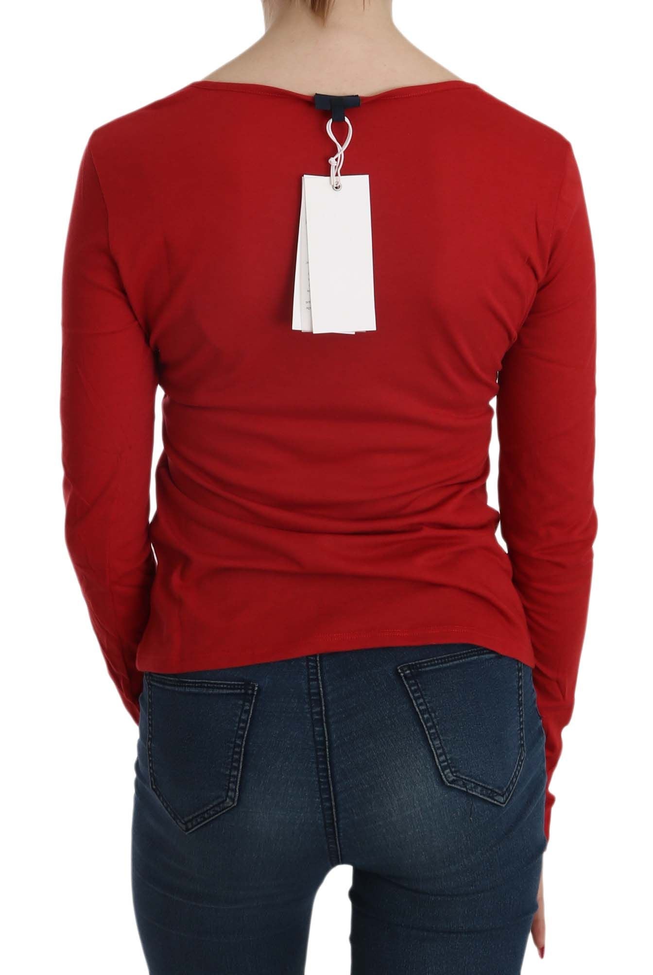 Exte ravissante blouse ornée de cristaux rouges