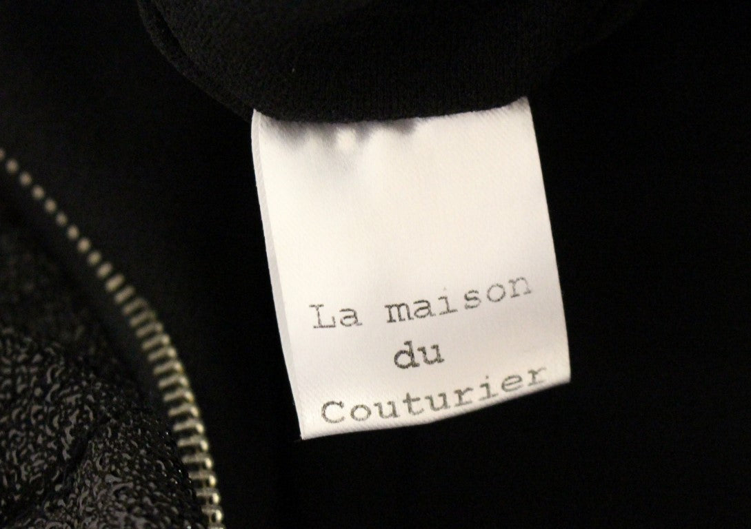 La maison du couturier combinaison en cuir noir avec ceinture