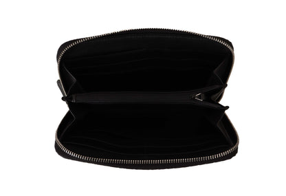 Cartera Gucci elegante de cuero negro con cremallera