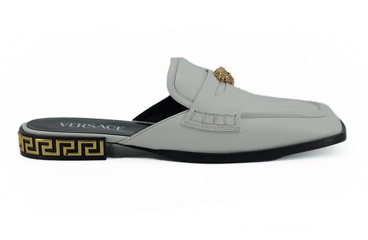 Claquettes plates en cuir blanc Versace