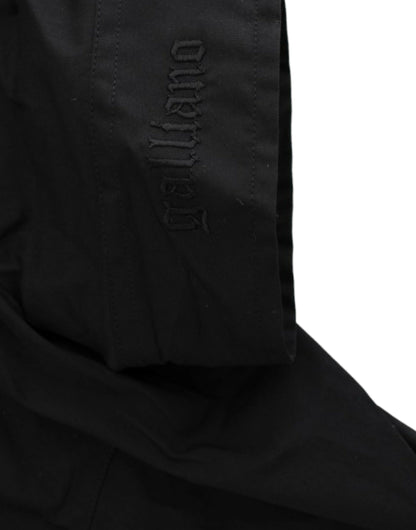 John Galliano Elegante blusa de manga corta elástica de algodón negro