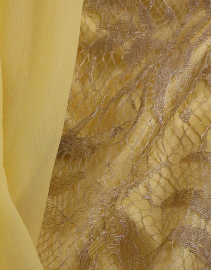 Dolce &amp; gabbana mini-robe en dentelle jaune ornée de cristaux