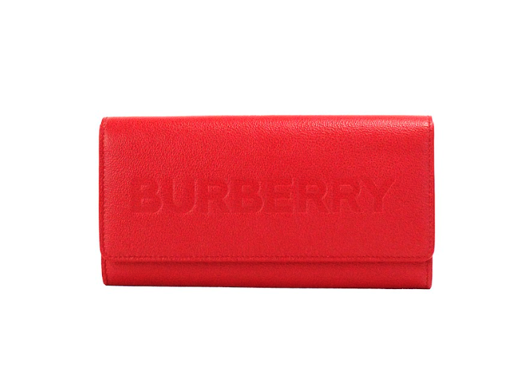 Burberry porter portefeuille à rabat en cuir grainé rouge gaufré