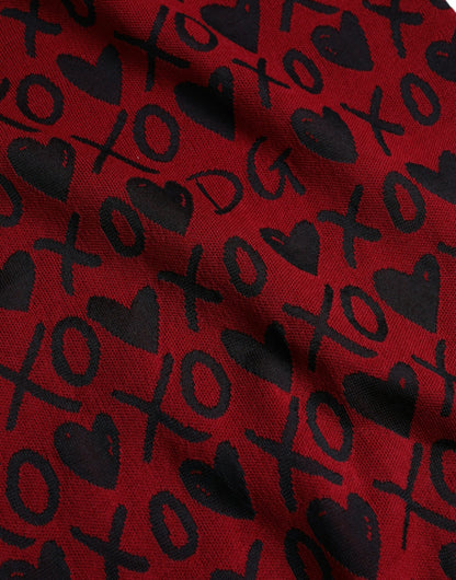 Dolce &amp; Gabbana Pull à col rond XOXO rouge noir