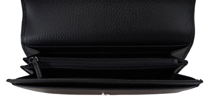 Gucci black leather wallet with gg snap closure