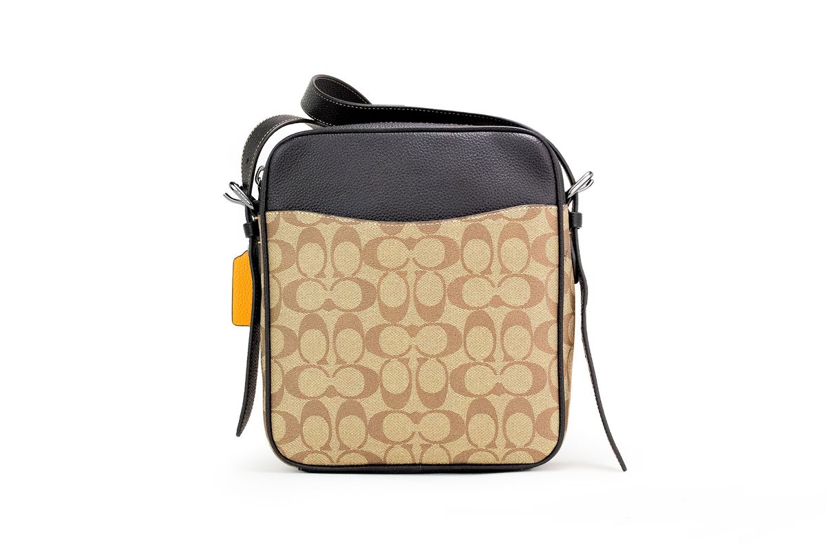 COACH Bolso bandolera Hudson 21 Signature de lona revestida con rayas universitarias